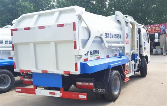 東風小多利卡側裝壓縮式對接垃圾車(5立方)圖片
